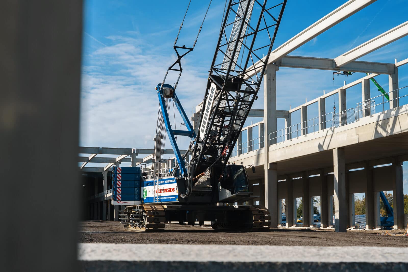 Het geïntegreerde prefab bouwmodel in actie op de bouw.
