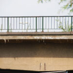 Concrete damage to a bridge.